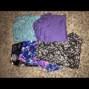 3 pants and 2 long sleeve workout shirts